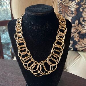 #148 - Gold Tone Multi-Ring Statement Necklace